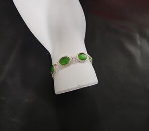 Avon Silver Bracelet with Green Accents